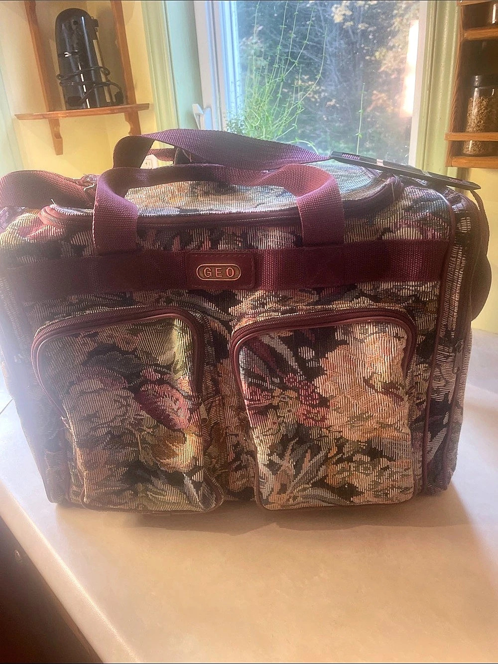 GEO Floral Tapestry Travel Bag in Burgundy